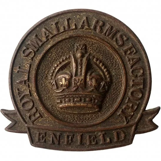 Insignia de la Royal Small Arms Factory de Enfield con la corona británica